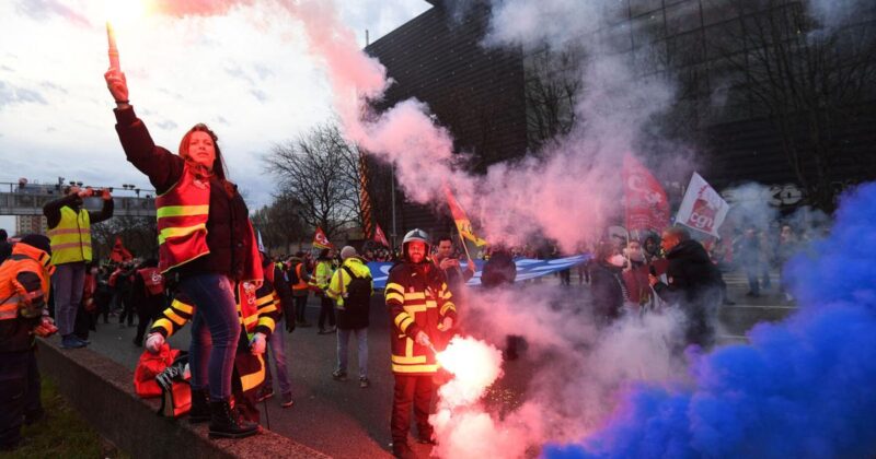 Hundreds detained in fiery protests after French government forces through higher retirement age